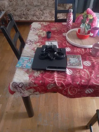 PlayStation 3 Nera con giochi e accessori