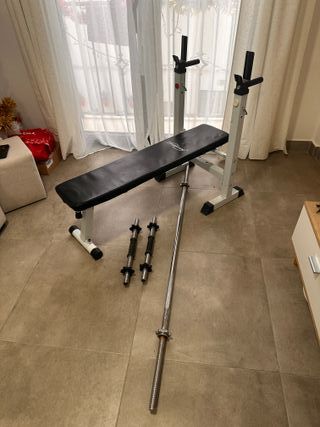 Banco de Pesas Multifuncional + Barras