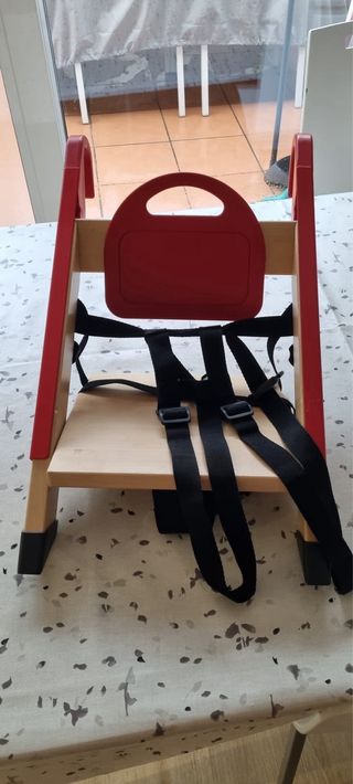 Trona portátil Stokke Handysitt roja