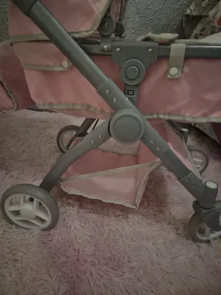 Carrito de paseo para muñecas rosa