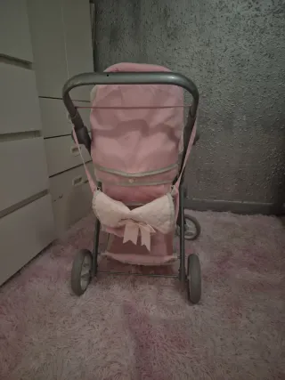 Carrito de paseo para muñecas rosa