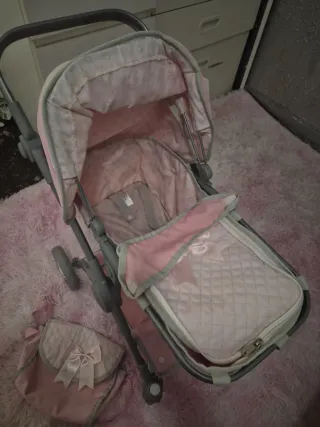 Carrito de paseo para muñecas rosa