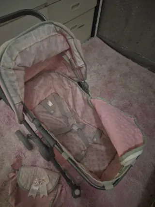 Carrito de paseo para muñecas rosa