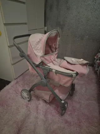 Carrito de paseo para muñecas rosa