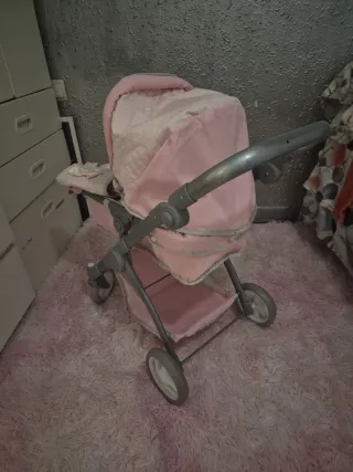 Carrito de paseo para muñecas rosa