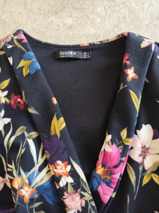 Tuta corta floreale nera