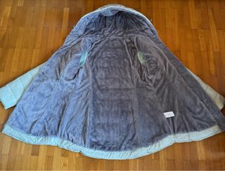 Piumino verde chiaro con cappuccio