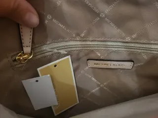 Mala Michael Kors Voyager Rosa