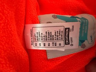 Mono de nieve azul y naranja 2-3 años