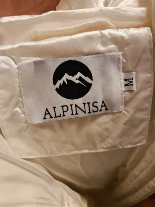 Abrigo blanco Alpina con capucha y pelo