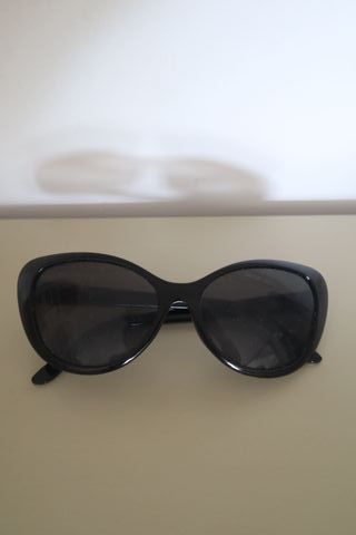 Gafas de sol negras redondas