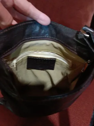 Bolso bandolera Prada  piel marrón .