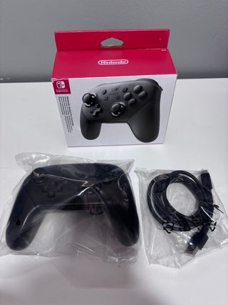 Nintendo Switch OLED + Mando Pro + Funda + Juegos