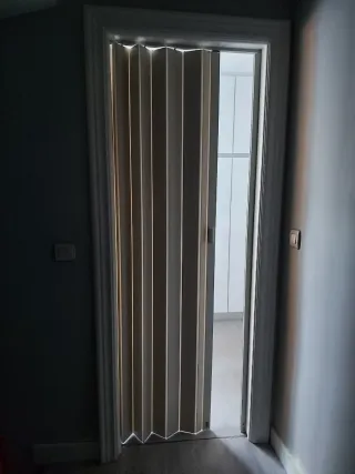 Puerta corredera fuelle PVC