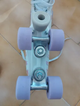 Patines Quad Lila Talla 32 (Decathlon).