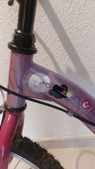 Bici Decathlon infantil morada 20 + casco