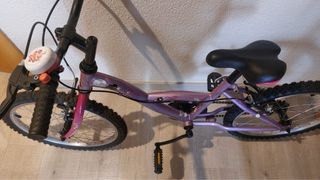 Bici Decathlon infantil morada 20 + casco