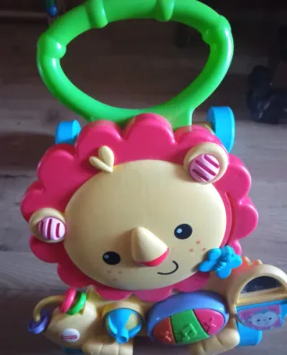 Triciclo infantil azul con barra de empuje