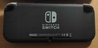 Nintendo Switch Lite Negra + Funda Azul