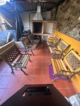 Sillas de hierro forjado y madera exterior