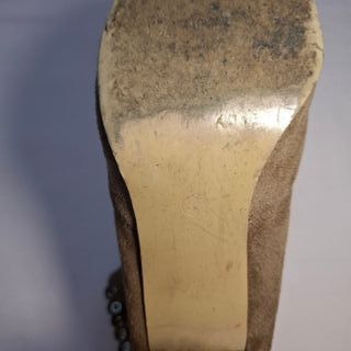 Botines ante camel detalle dorado