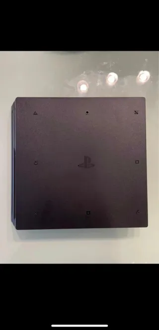 PS4 Pro 1TB + Mando + Cables + 2 Juegos