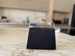 Bolso de fiesta negro mini con asa plateada