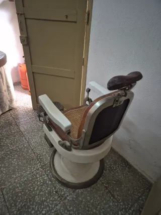 Sillón de barbero antiguo Triumph