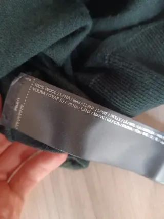 Jersey verde oscuro, 100% lana merino. Talla S