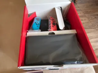 Nintendo Switch OLED Azul y Rojo