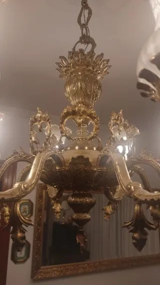 Lámpara de bronce dorada y transparente