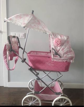 Muñeca Reborn toda silicona con carrito y capota