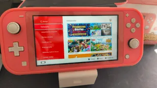 Nintendo Switch Lite Rosa + Custodia + Supporto