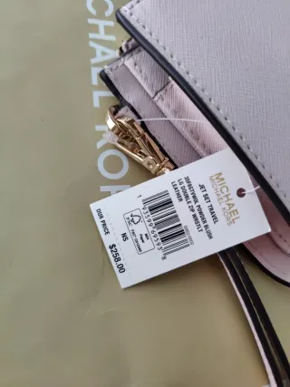 Cartera Michael Kors Rosa y Dorada