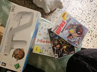 Nintendo Wii Zapper + 3 Juegos Wii