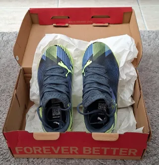 Botas multititaco Puma Future 7 Jr. Solo un uso.