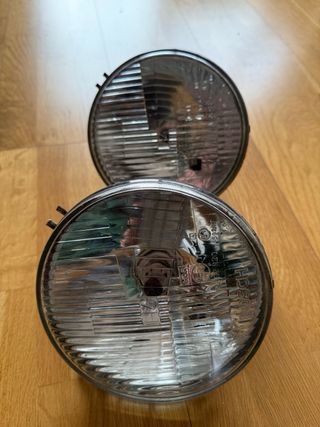 Juego faros delanteros. Polo 2ª generación Bosch.