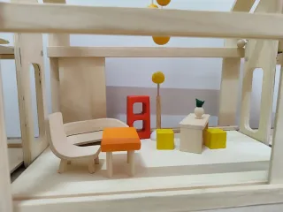 Casa de muñecas modular Plan Toys