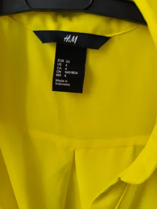 Blusa H&M sin mangas amarilla Talla 34