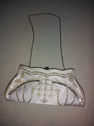 Bolso de fiesta blanco y dorado