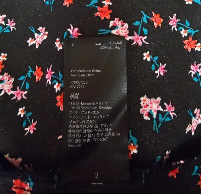 Vestido mini H&M floral negro y rosa