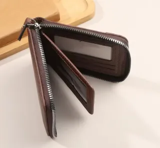 Cartera de piel Dizorris para hombre