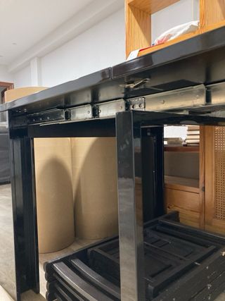 Mesa de comedor extensible negro piano