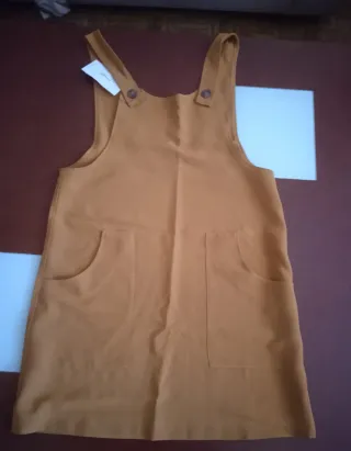 Ropa chica. Peto amarillo talla M