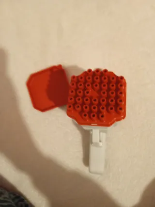 Pistola de burbujas roja