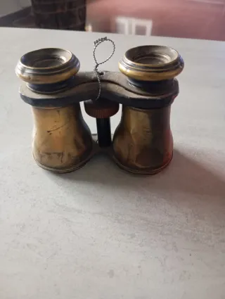 Prismáticos antiguos dorados