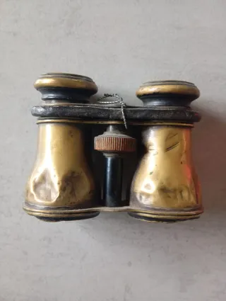 Prismáticos antiguos dorados