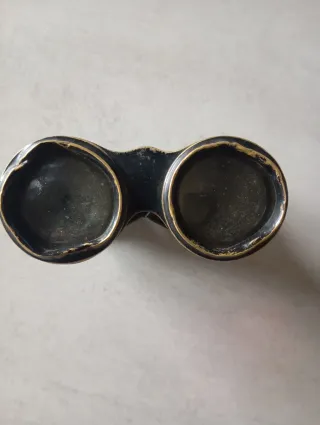 Prismáticos antiguos dorados
