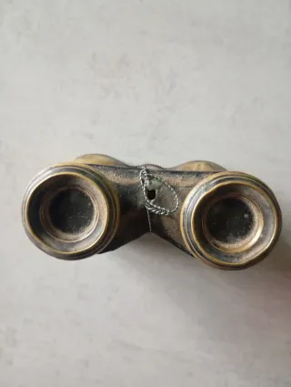 Prismáticos antiguos dorados