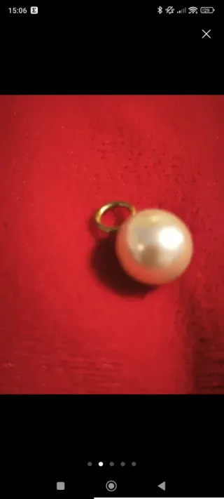 Cadena y colgante laminado en oro con perla